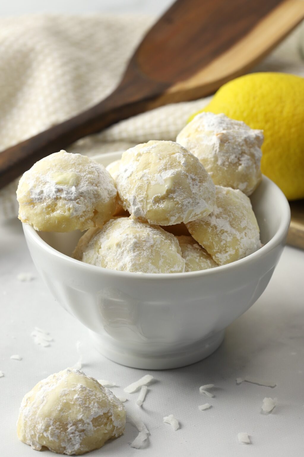 Lemon Coconut Snowball Cookies - The Toasty Kitchen