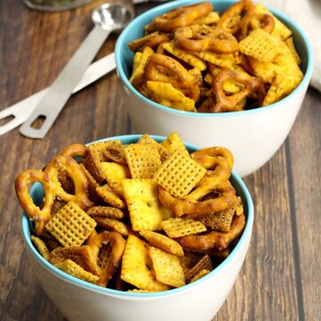 Buffalo ranch chex mix in serving bowls.