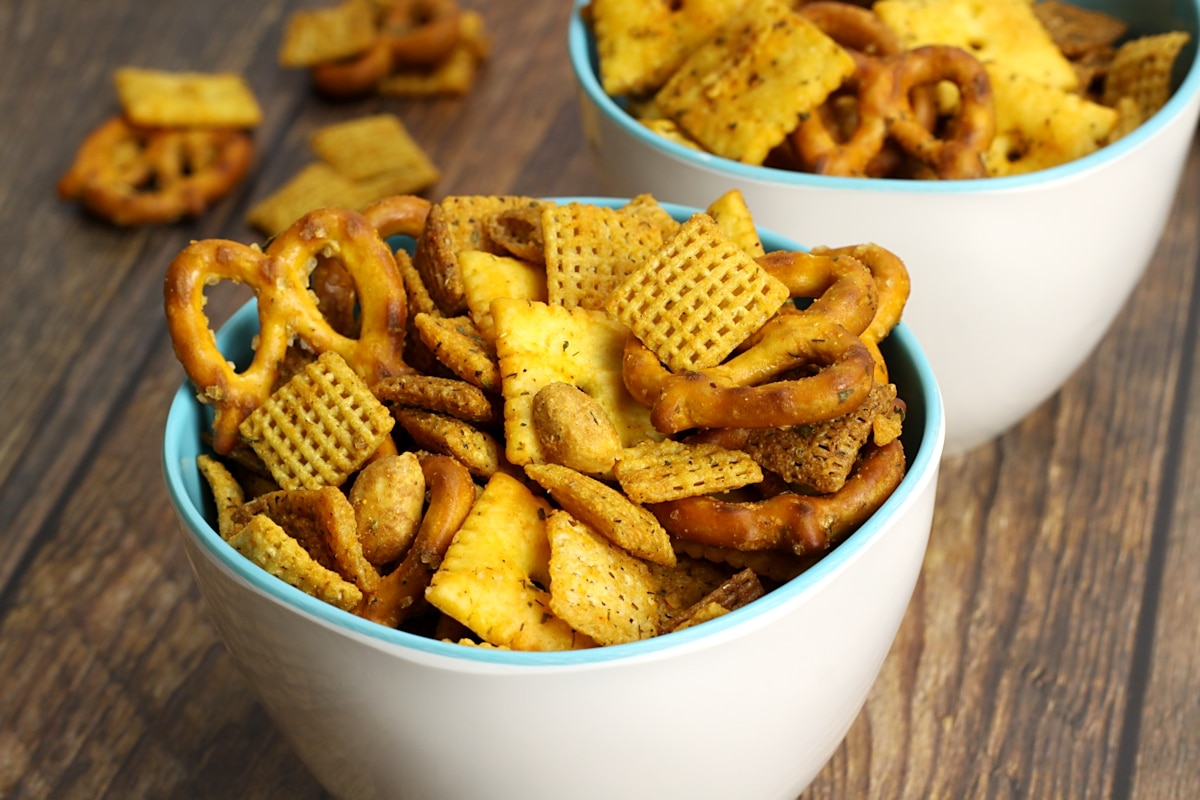 Chex cereal, cheese crackers, and pretzels in a snack mix.