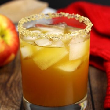 Apple pie cocktail in a lowball glass.