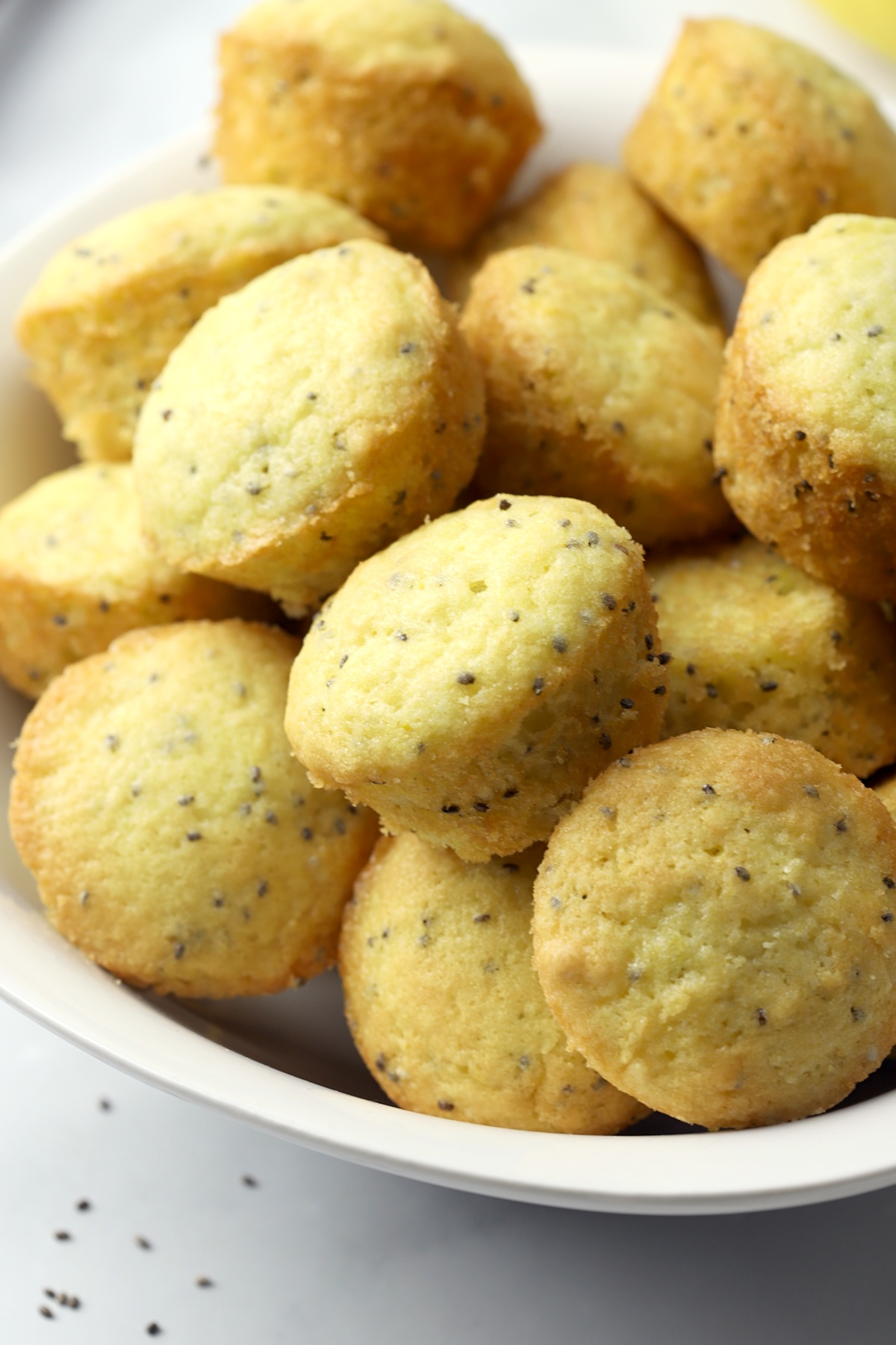 Mini muffins filled with chia seeds and lemon zest.