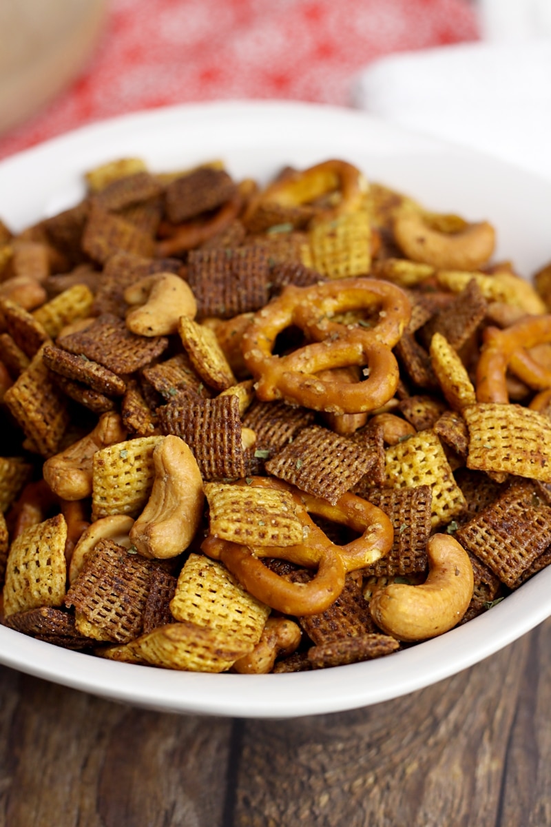 Chex cereal, pretzels, and cashews in a snack mix.