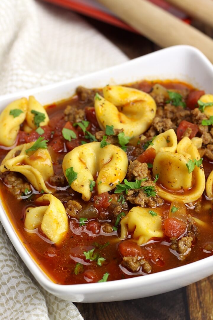 Tortellini and ground beef in a chunky tomato soup.