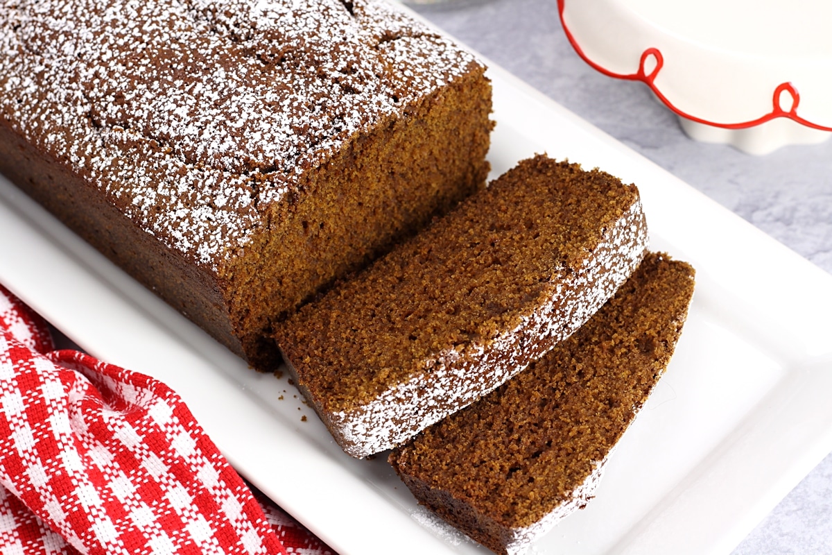 Slices of gingerbread topped with powdered sugar.