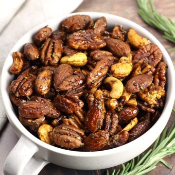 Glazed mixed nuts in a bowl.