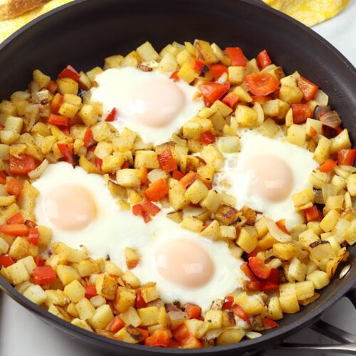 https://thetoastykitchen.com/wp-content/uploads/2018/12/hash-browns-eggs-skillet-toasty-kitchen-13-500x500.jpg