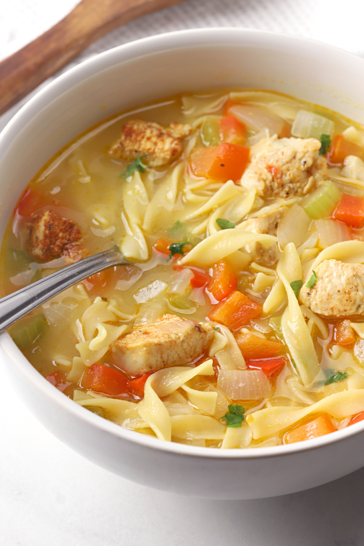 Chicken Noodle Soup In Bowl With Spoon 