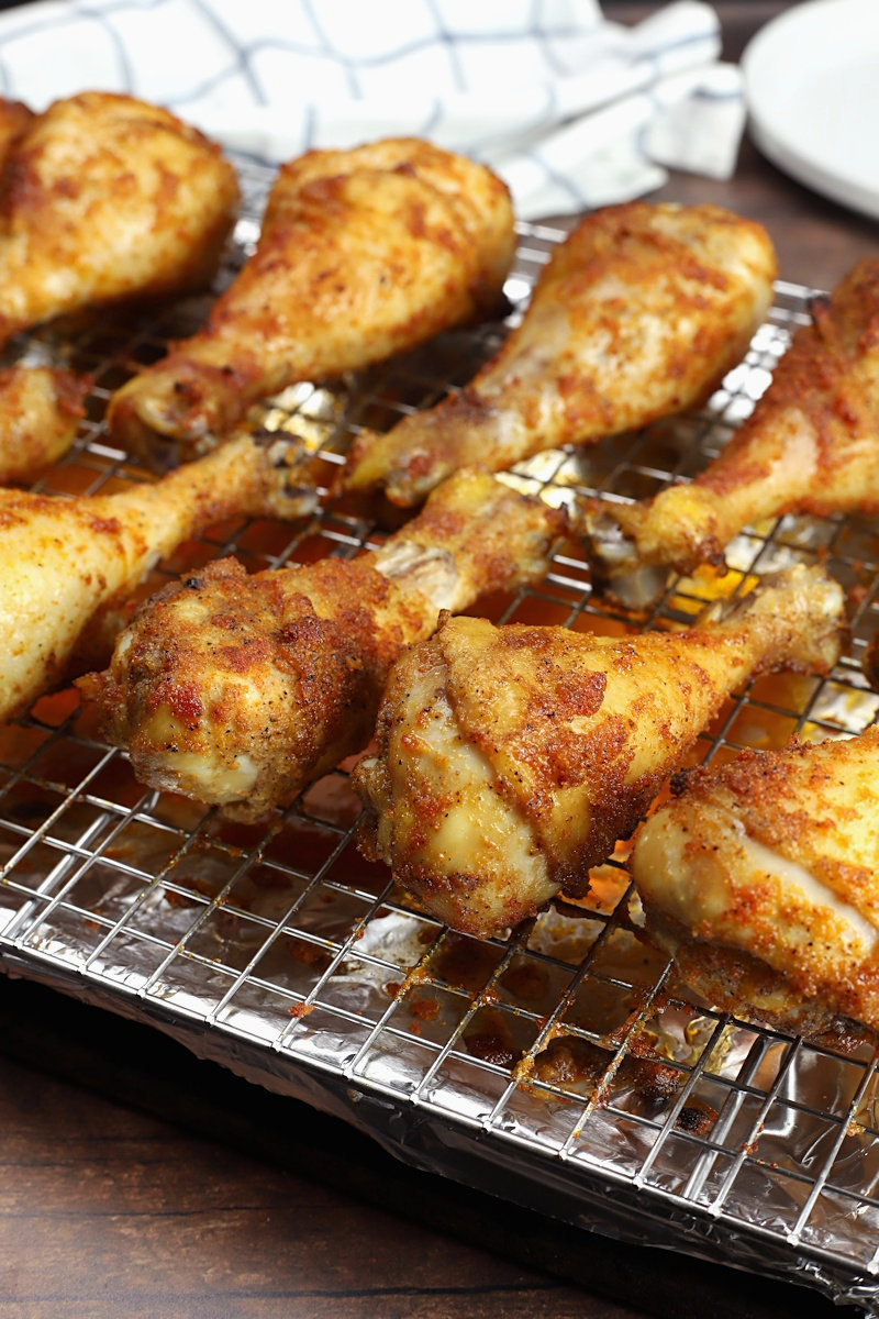 How To Make Chicken Legs In The Oven - Place drumsticks on foil lined ...