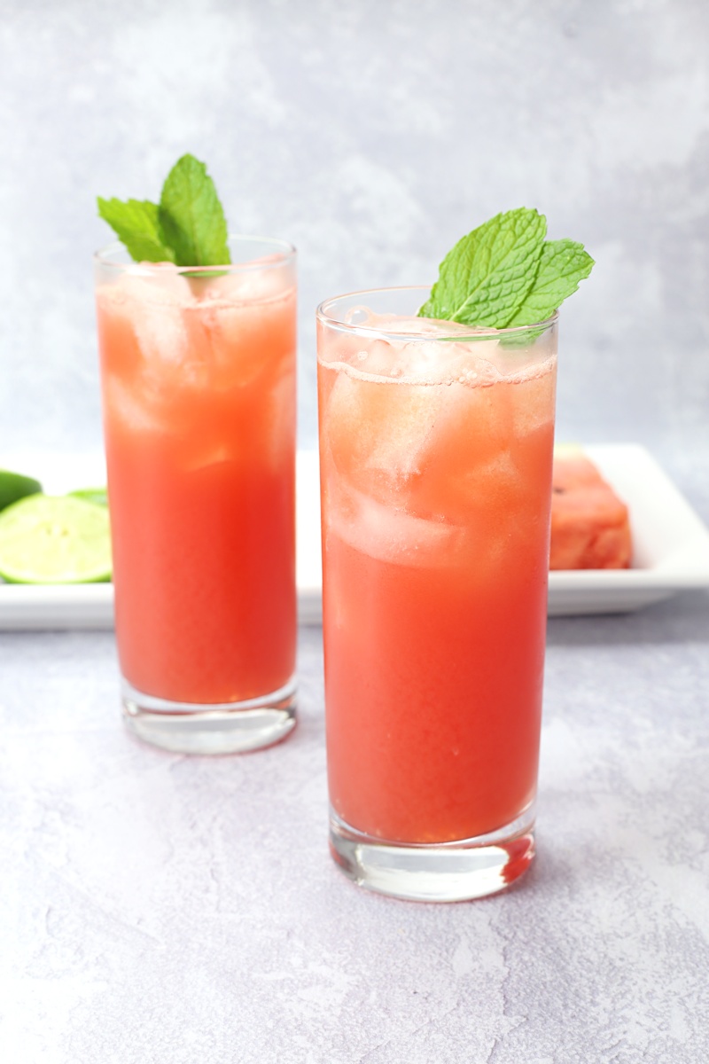 Two watermelon cocktails on a countertop