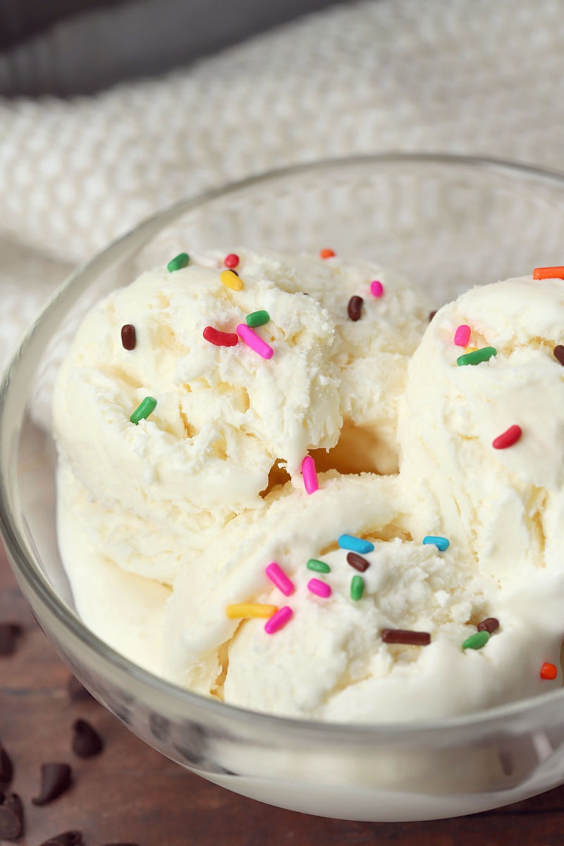 Rainbow sprinkles on top of a homemade batch of no churn ice cream.