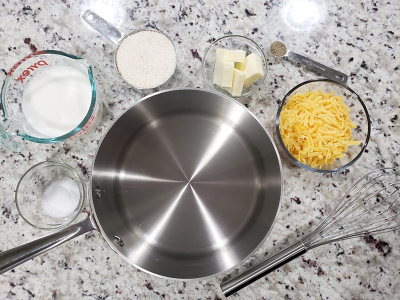 Ingredients for grits on a counter top.