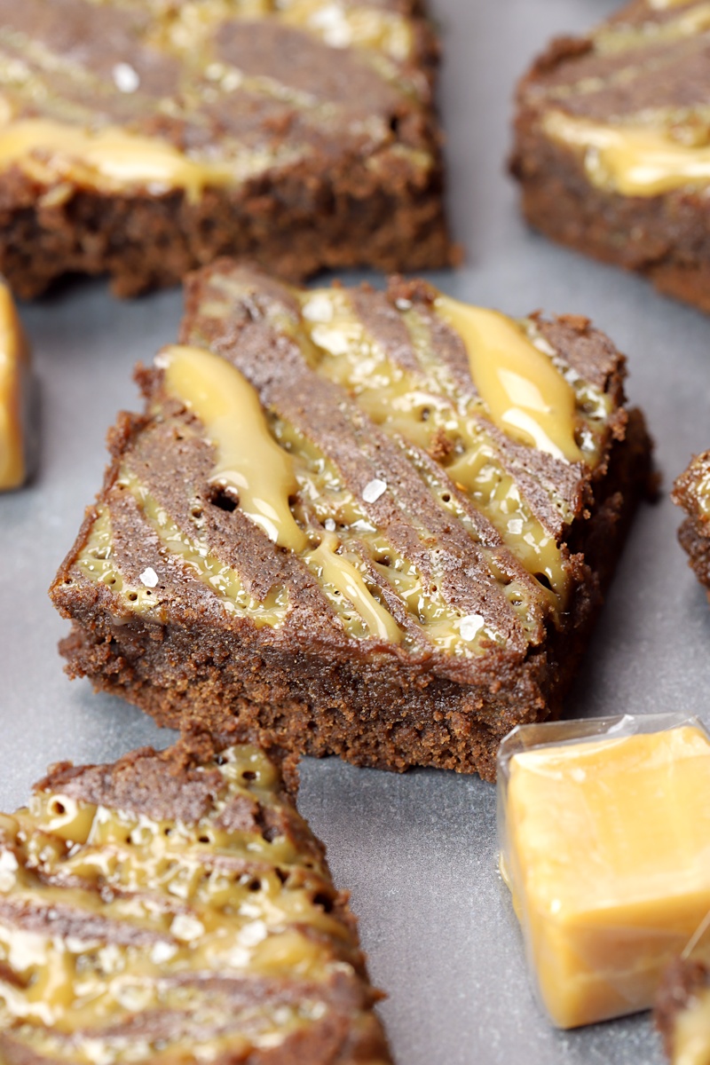 Brownies laying on a counter top.