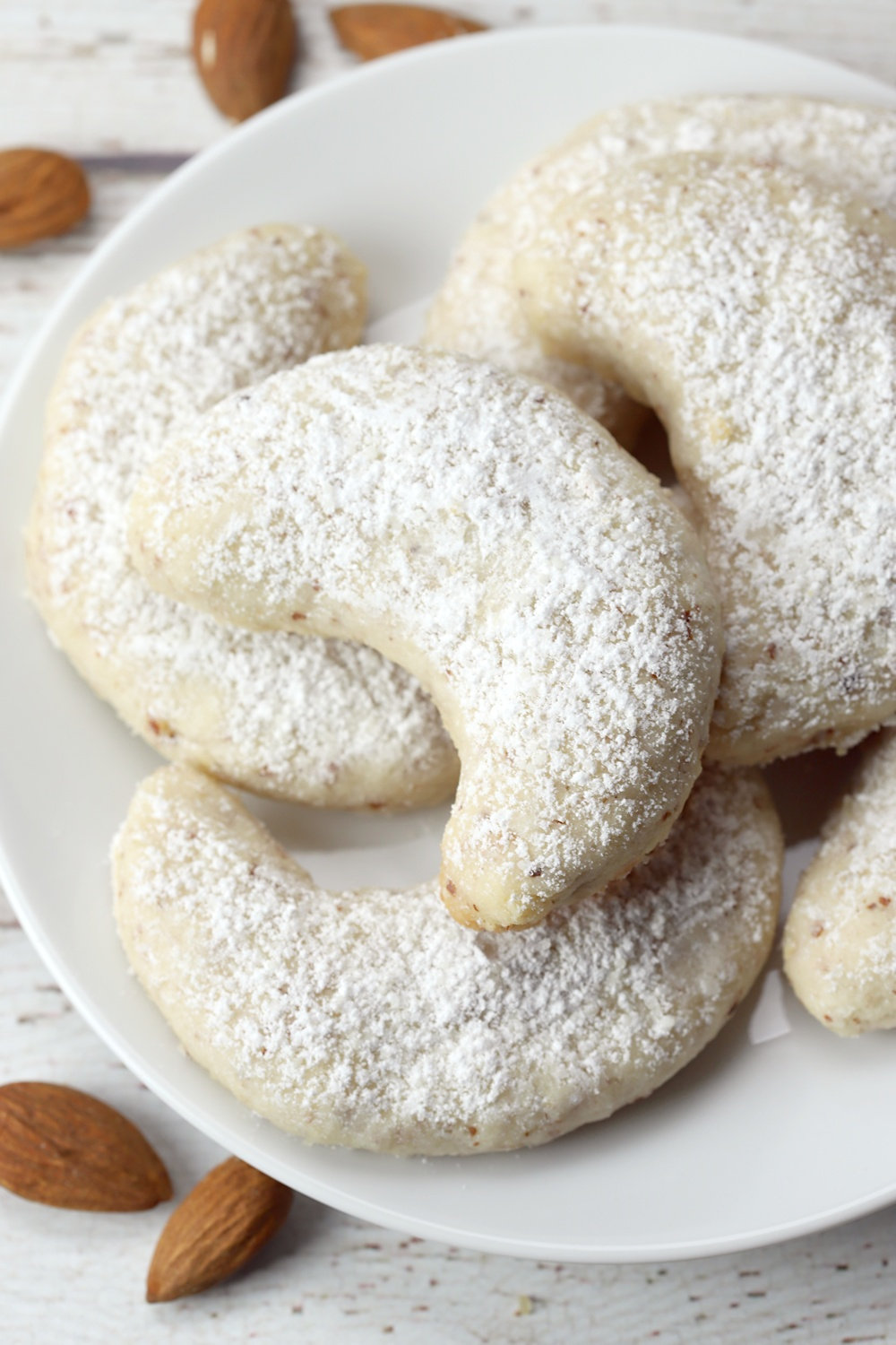 Vanillekipferl vanilla crescent cookies on a serving plate.