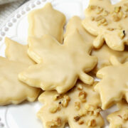A maple leaf cookie with maple glaze on top.