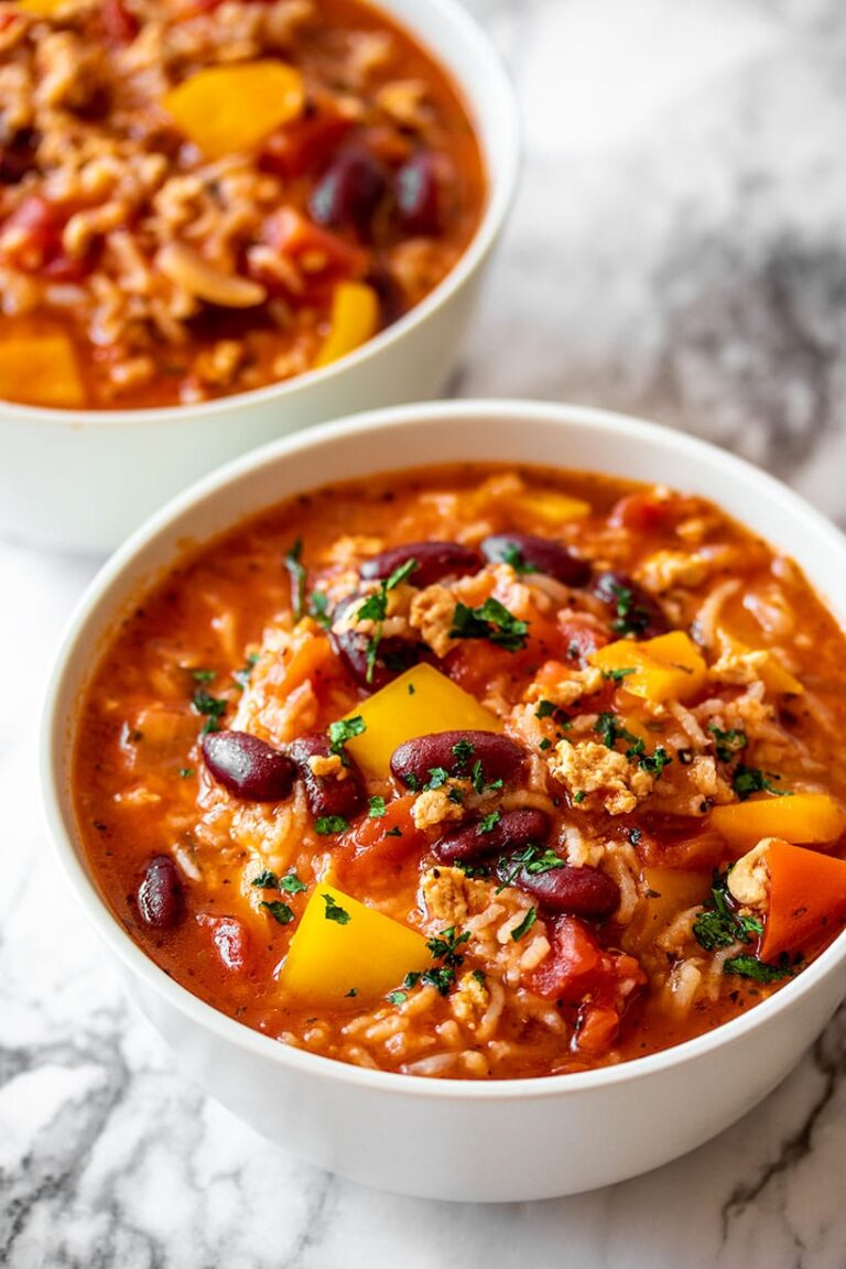 Stuffed pepper soup in a white bowl.