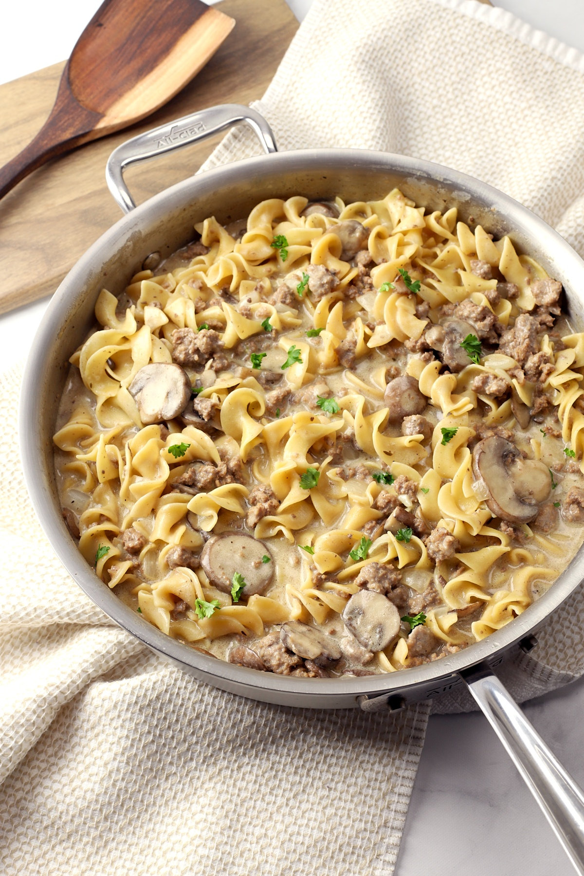 Saute pan filled with ground beef stroganoff.