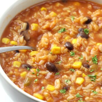 Soup with corn, black beans, and rice.