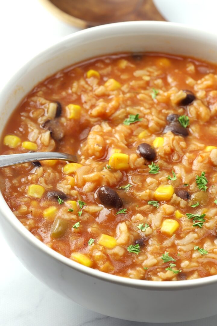 Soup with corn, black beans, and rice.