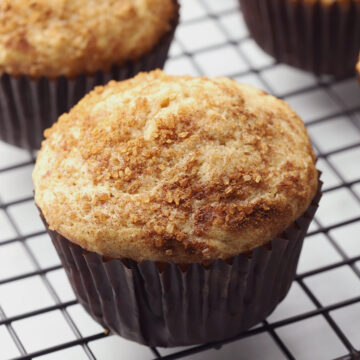 Walnut muffins on a cooling rack.