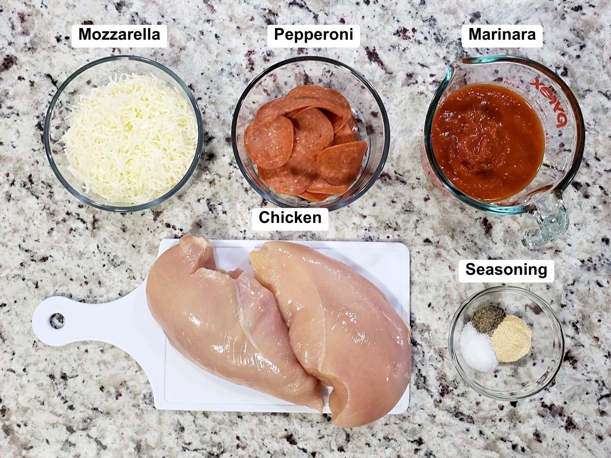 Ingredients for pizza stuffed chicken.