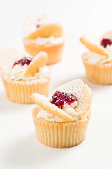 Cupcakes topped with strawberry jam.