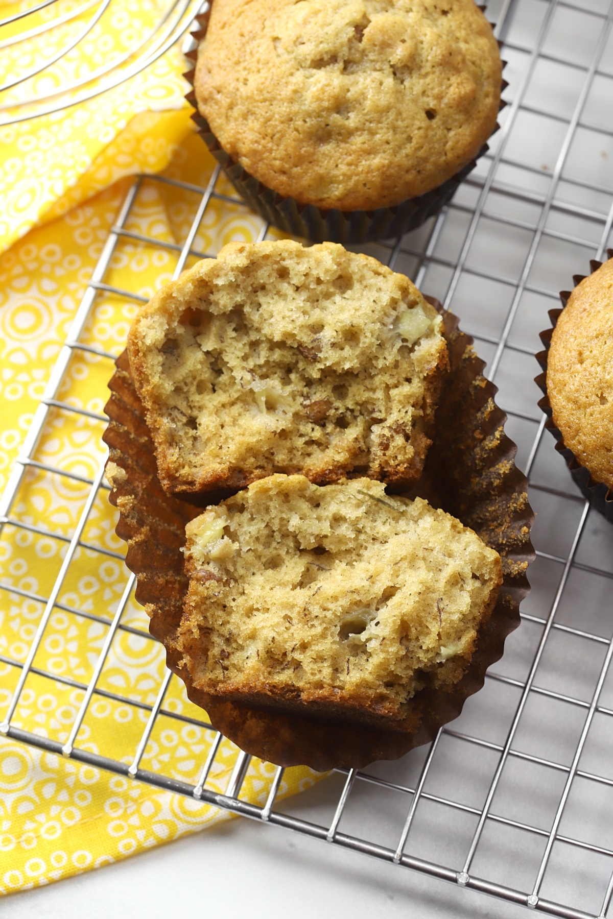 Banana nut muffin torn in half.