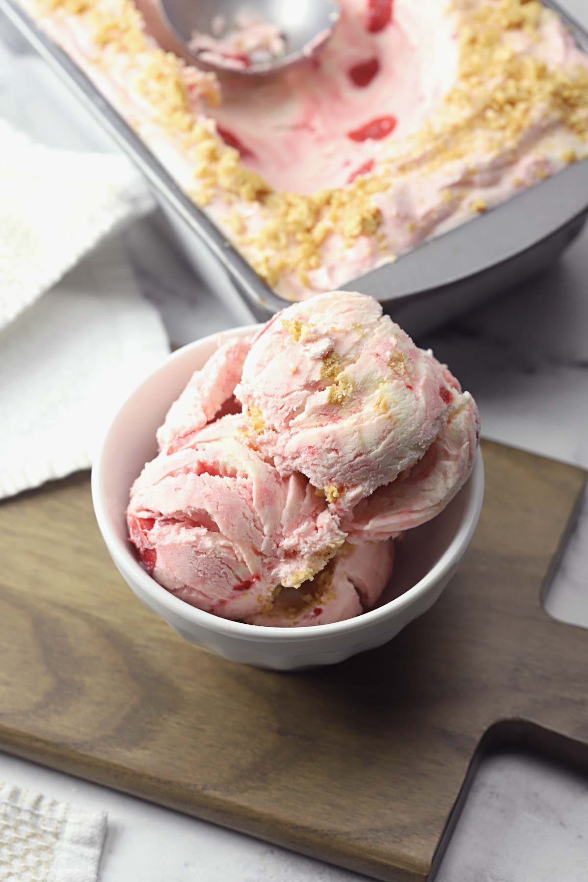 Bowl of cherry cheesecake ice cream.