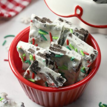 Red cup filled with oreo peppermint bark.