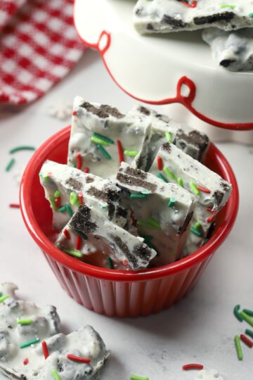 Red cup filled with oreo peppermint bark.
