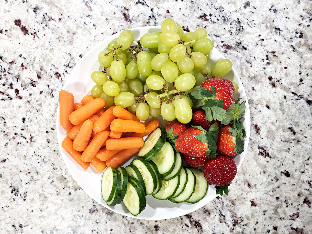 Fruit and vegetables prepared for charcuterie board.