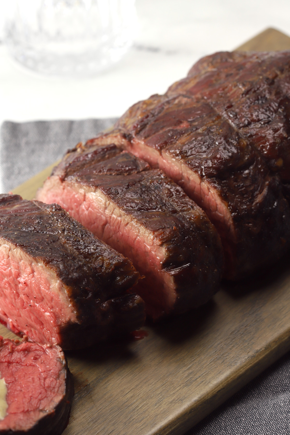 Slow roasted beef tenderloin sliced into servings.