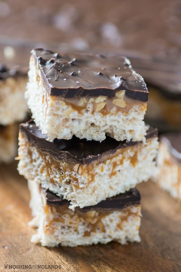 A stack of snickers rice krispies treats.