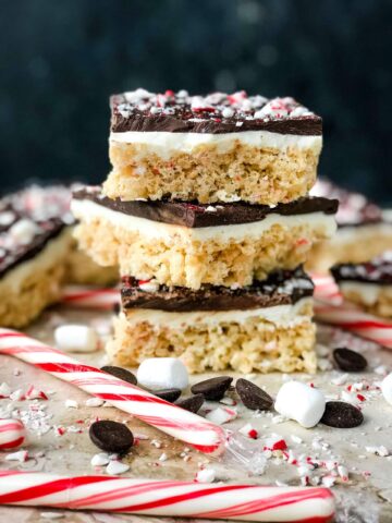 Rice krispies treats topped with peppermint bark candy.
