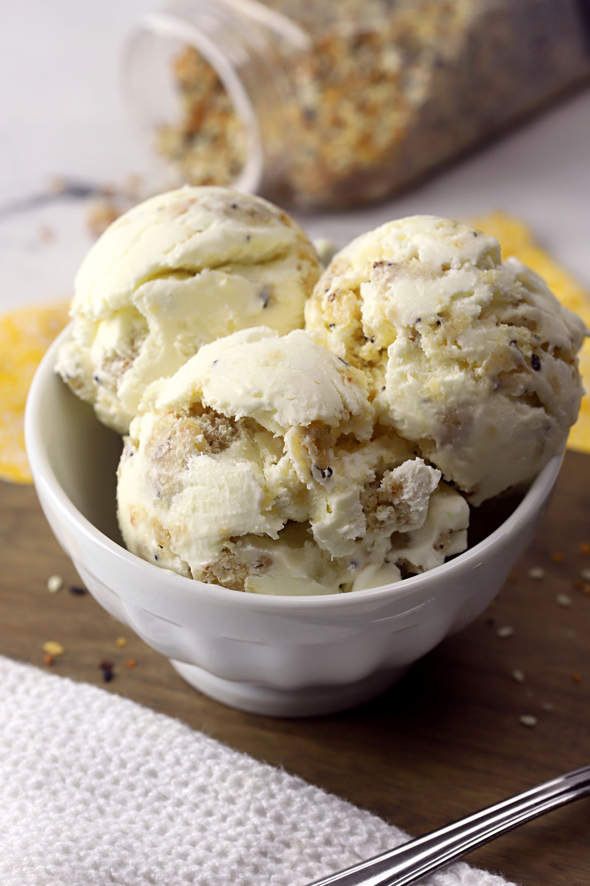 A white bowl filled with everything bagel ice cream.