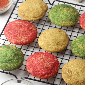 Christmas snickerdoodles on a cooling rack.