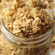 Glass jar filled with coconut granola.
