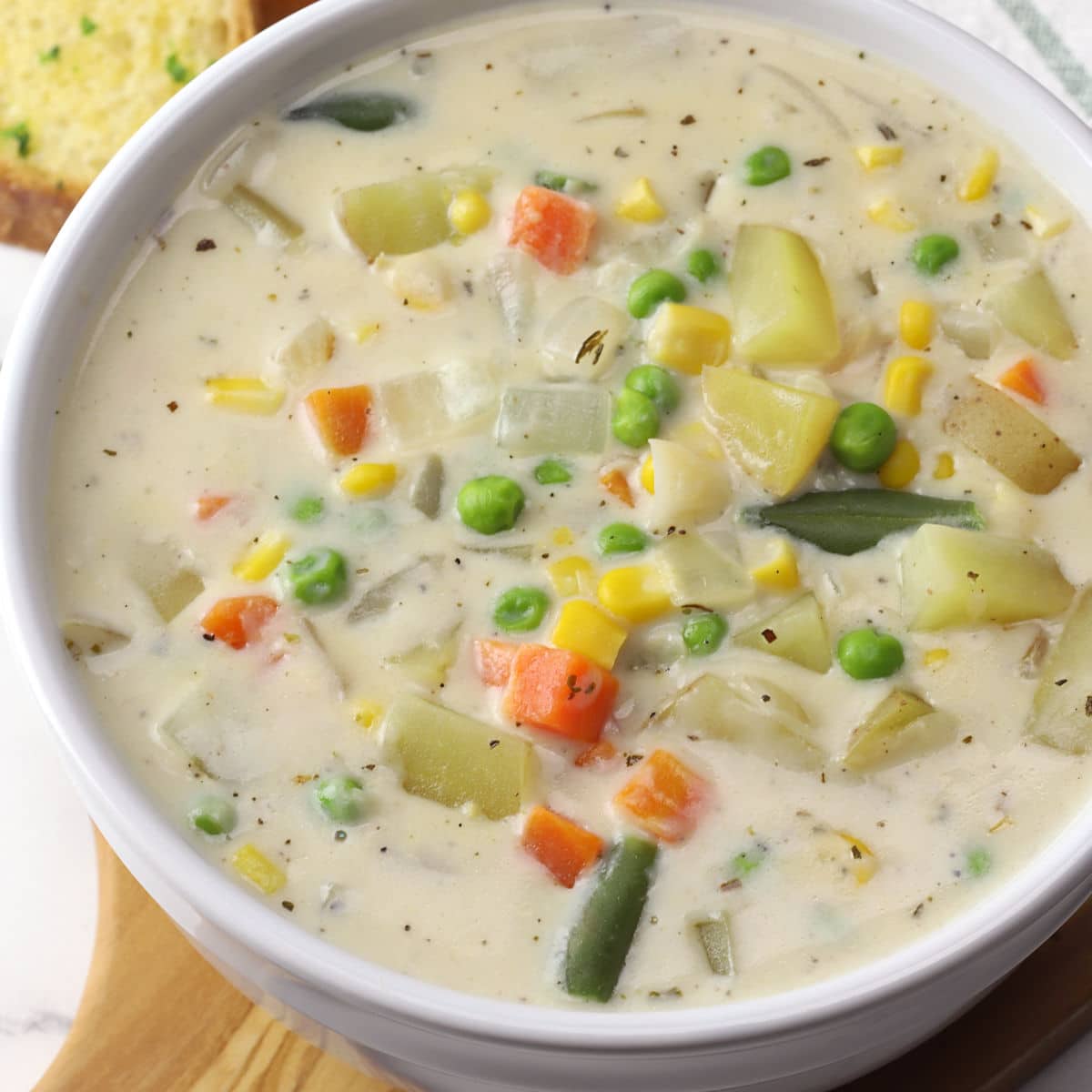 https://thetoastykitchen.com/wp-content/uploads/2023/03/creamy-vegetable-soup-feat.jpg