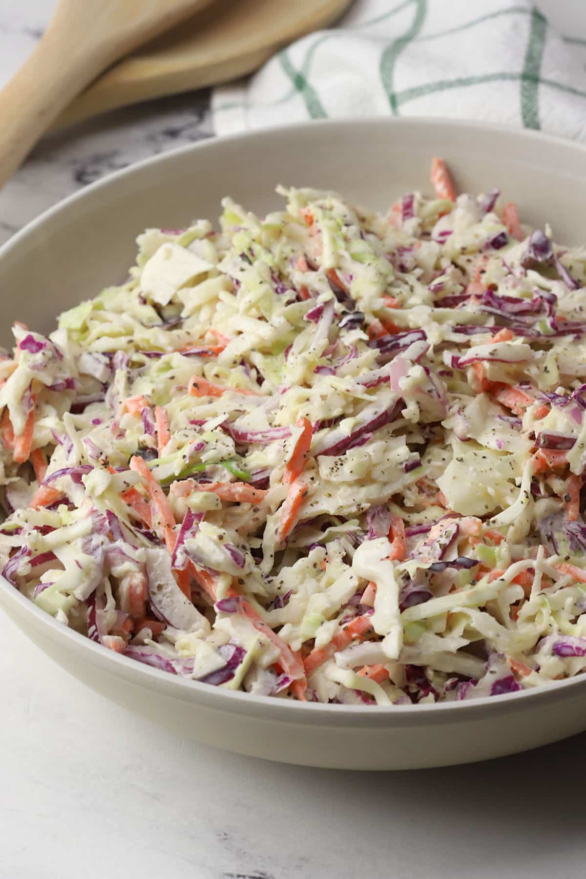 A serving bowl filled with southern coleslaw.