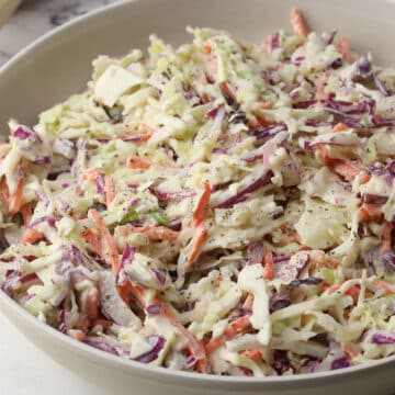 A serving bowl filled with southern coleslaw.
