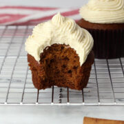 Gingerbread cupcakes on a cooling rack.