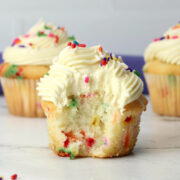 Confetti cupcake with a bite missing.
