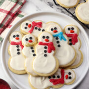 A plate of snowman cookies.