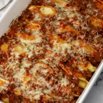 A casserole dish of beef stuffed shells.