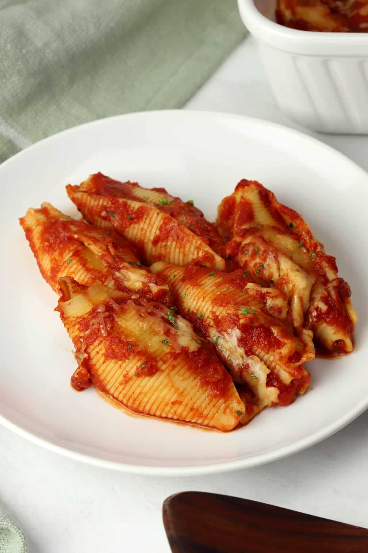 Cheese stuffed shells on a plate.