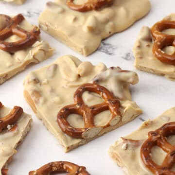 Squares of peanut butter pretzel bark.