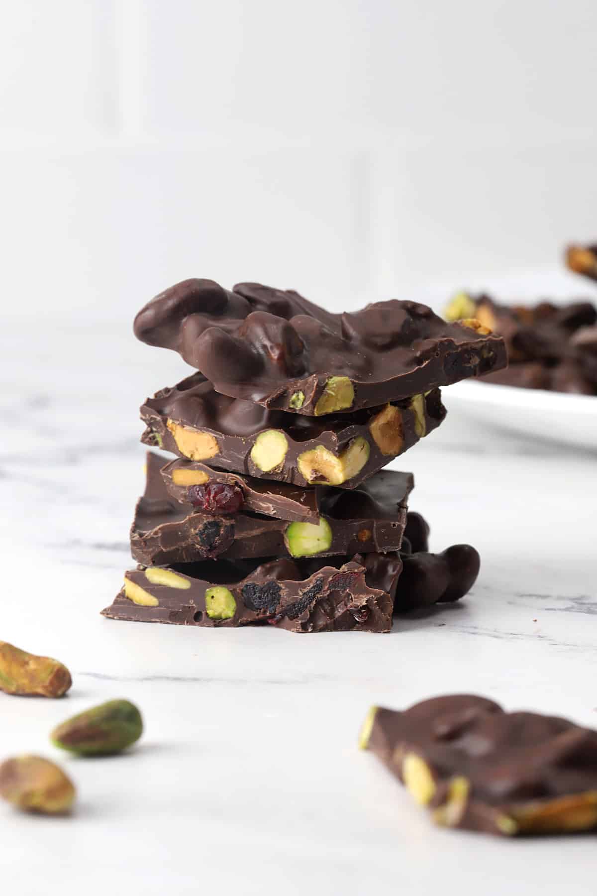 A stack of pistachio cranberry bark.