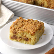 A square of coffee cake on a plate.
