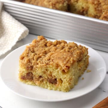 A square of coffee cake on a plate.