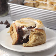 A cinnamon roll on a plate.