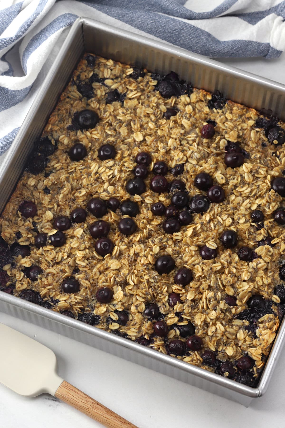 A pan of blueberry baked oatmeal on a countertop.